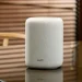 WiiM Sound Lite smart højttaler i sort og hvid finish